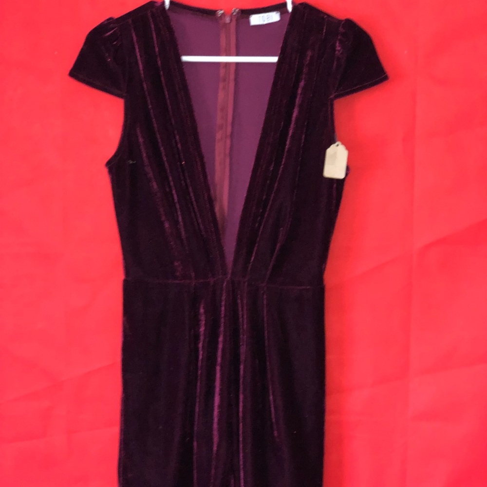 Red velvet jumpsuit.